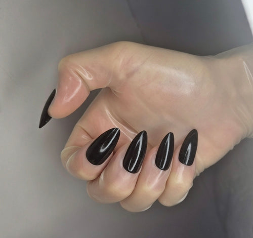 Transparent latex gloves with shiny black nails